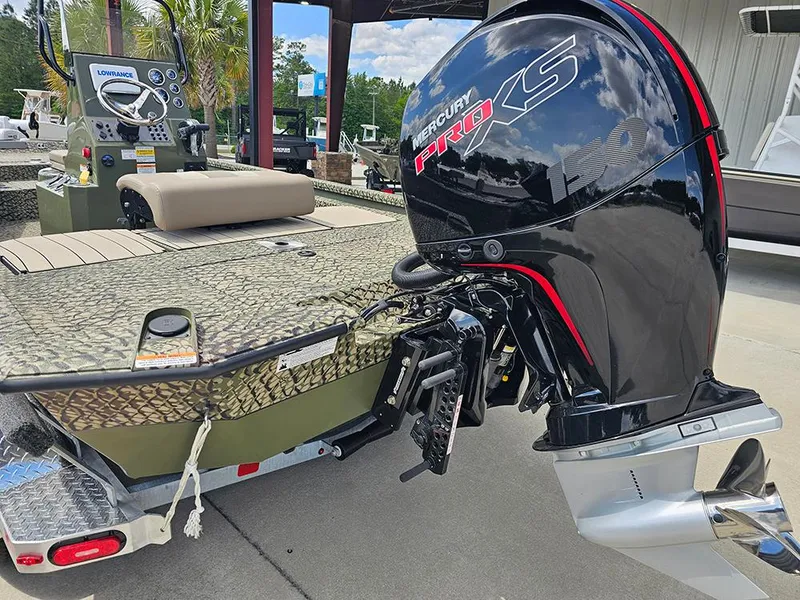 Slide: The Image of 2025 Vexus ACX 2000 boat with Mercury Pro XS engine, parked on a trailer. - 6