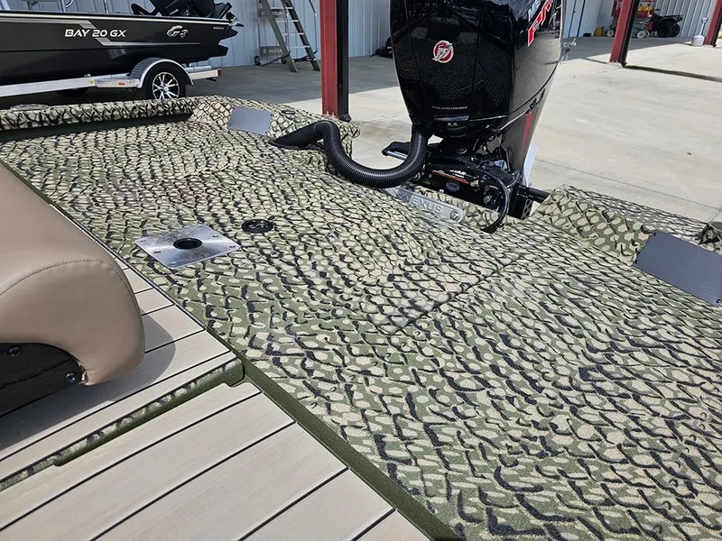 Slide: The Image of 2025 Vexus ACX 2000 boat with camo deck and powerful outboard motor. - 7