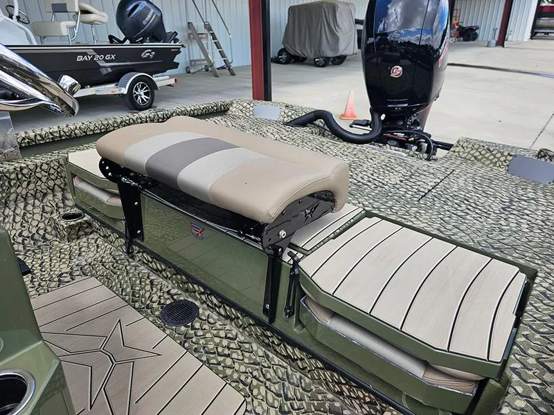 Slide: The Image of 2025 Vexus ACX 2000 boat interior with camouflage design and cushioned seating. - 9