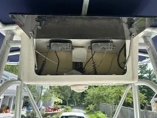 Slide: The Image of 2001 Sea Hunt Triton 200 boat console with dual radios and wiring. - 6