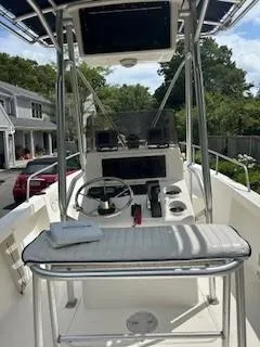 Slide: The Image of 2001 Sea Hunt Triton 200 boat interior with steering console and seating. - 7