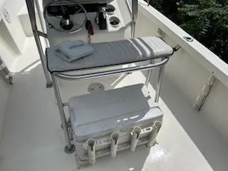 Slide: The Image of 2001 Sea Hunt Triton 200 boat interior with steering console and seating. - 8