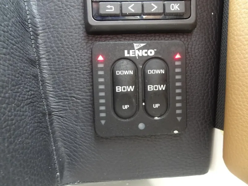 Slide: The Image of Control panel with Lenco trim tab switches in a 2025 Cobalt R8. - 14