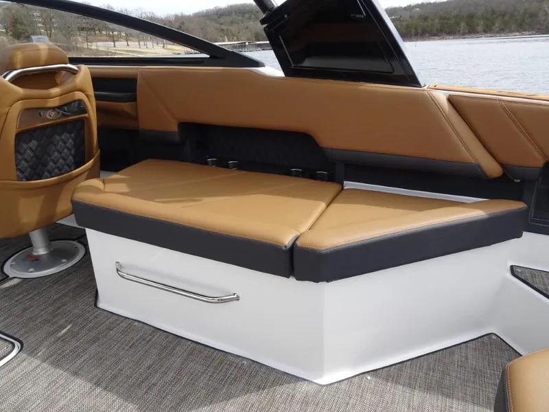 Slide: The Image of Luxurious interior of 2025 Cobalt R8 boat with tan seating and modern design. - 9