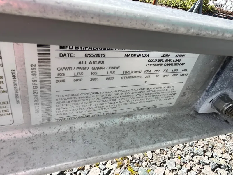 Slide: The Image of Label on a Pro-Line 20 WALK 2001 trailer, showing manufacturing details and specifications. - 24