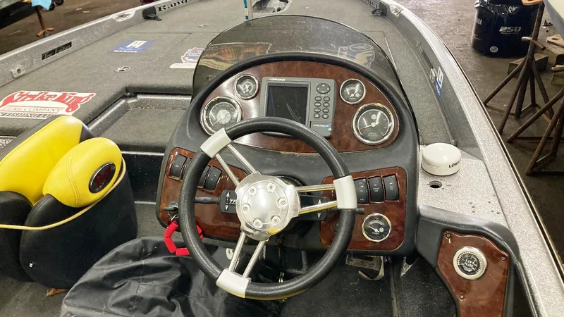 Slide: The Image of 2007 Ranger 519 VX boat dashboard with steering wheel and gauges. - 5