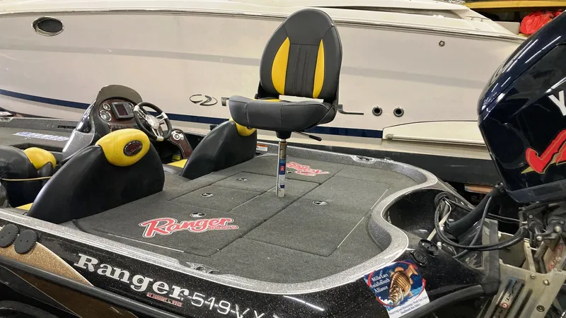 Slide: The Image of 2007 Ranger 519 VX boat deck with fishing seat and equipment. - 6