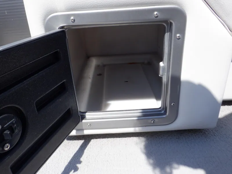 Slide: The Image of Open storage compartment on 2014 Weeres Cadet Cruise 200 boat. - 20