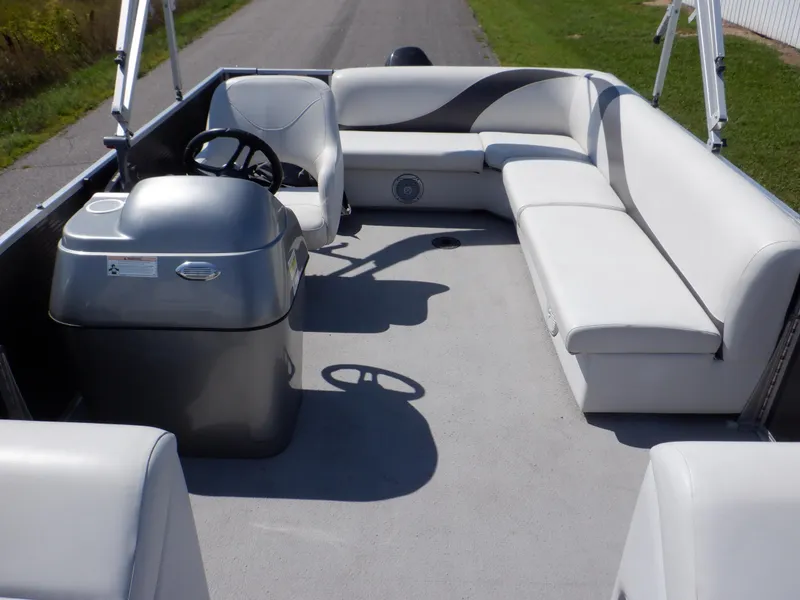 Slide: The Image of 2014 Weeres Cadet Cruise 200 pontoon boat with spacious seating and sleek design. - 21