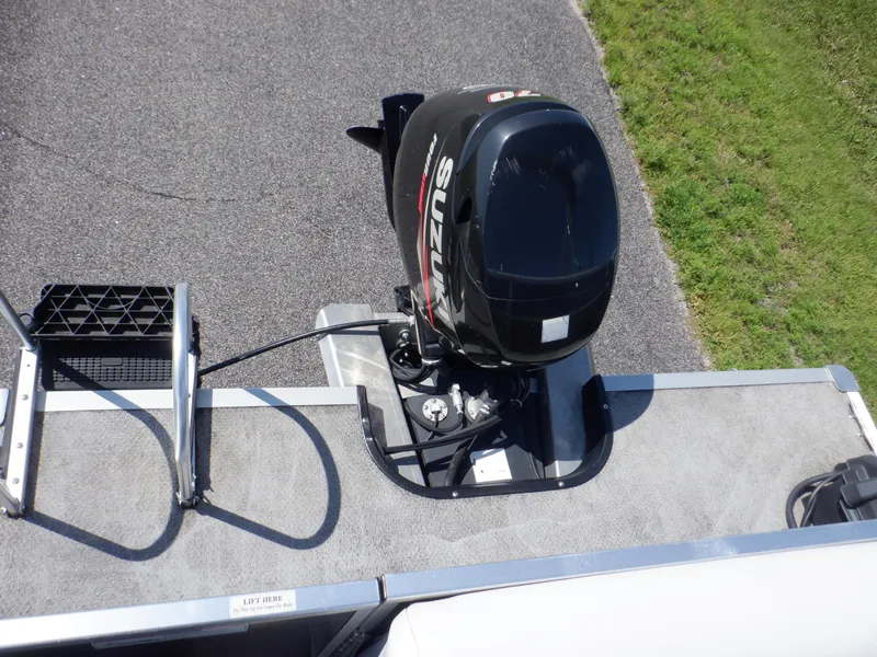 Slide: The Image of 2014 Weeres Cadet Cruise 200 with Suzuki outboard motor, viewed from above. - 32