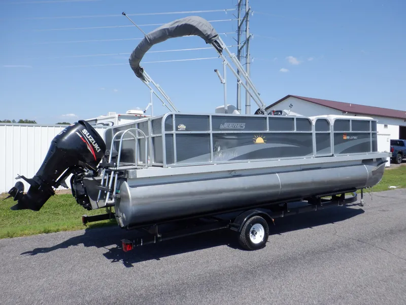 Slide: The Image of 2014 Weeres Cadet Cruise 200 pontoon boat on trailer, with Suzuki outboard motor. - 6
