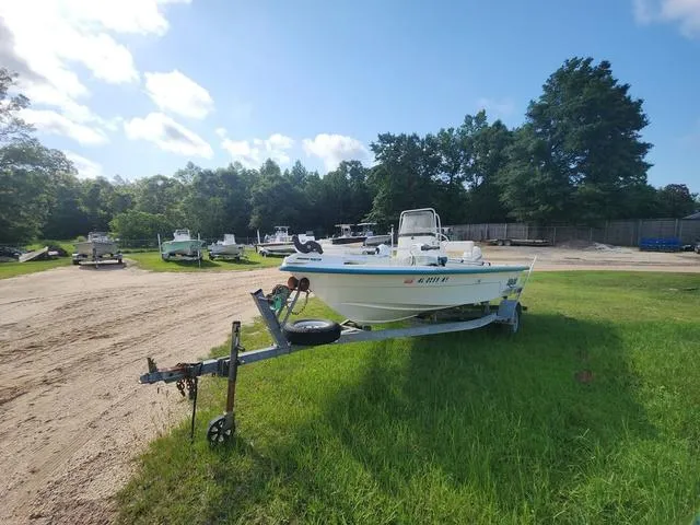 Slide: The Image of 2007 Sundance SV17 boat on trailer in grassy outdoor area. - 1