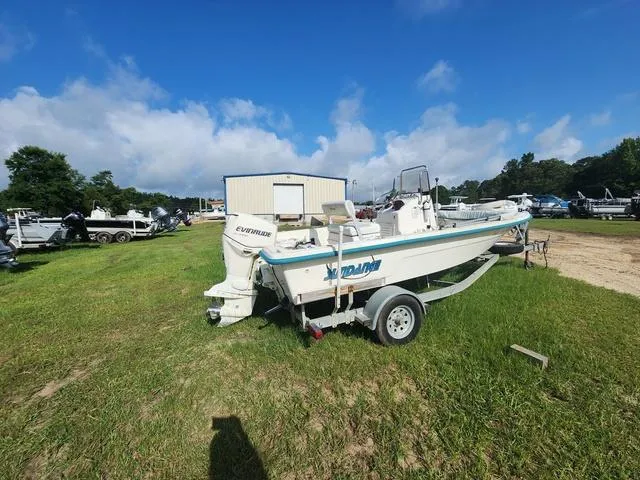 Slide: The Image of 2007 Sundance SV17 boat on trailer in grassy outdoor lot. - 4