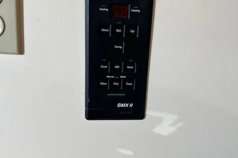 Slide: The Image of Control panel of a 1999 Albemarle 305 Express Fisherman boat. - 17