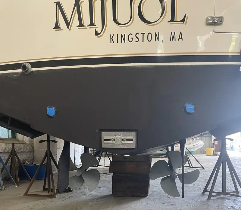 Slide: The Image of 1999 Albemarle 305 Express Fisherman boat, rear view, with propellers, named "Mijuol," Kingston, MA. - 9