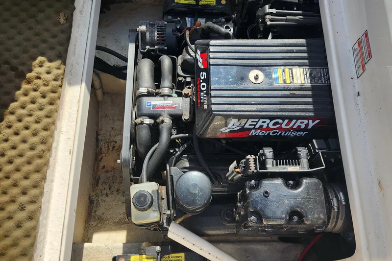 Slide: The Image of Engine compartment of a 2001 Sea Ray 215 with Mercury MerCruiser 5.0L engine. - 18
