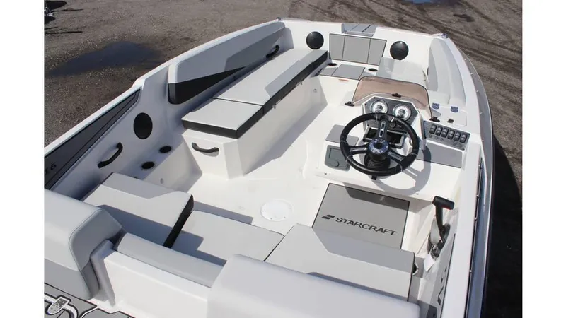 Slide: The Image of 2025 Starcraft SV 16 OB boat interior with steering wheel and seating. - 4