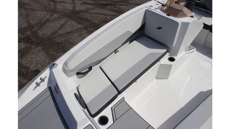 Slide: The Image of 2025 Starcraft SV 16 OB boat interior with cushioned seating and cup holders. - 6