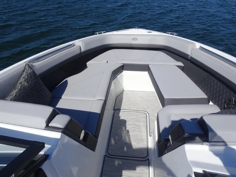 Slide: The Image of Luxurious seating area on 2025 Cobalt R8 boat, featuring sleek design and comfortable cushions. - 16