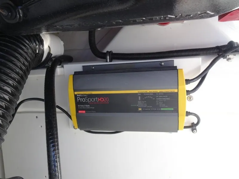 Slide: The Image of Battery charger installed in a 2025 Cobalt R8 boat, featuring ProSportHD20 model. - 19