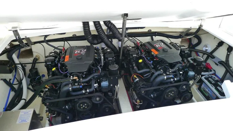 Slide: The Image of 2004 Formula 330 Sun Sport engine compartment with dual engines. - 6