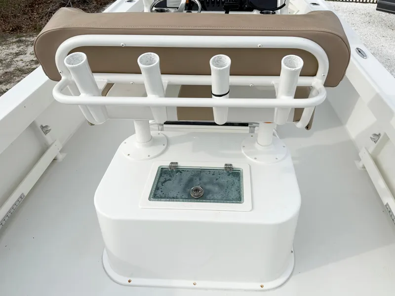 Slide: The Image of 2019 Parker 23 Special Edition boat with rod holders and cushioned seating. - 10