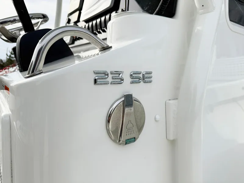 Slide: The Image of Parker 23 Special Edition 2019 boat detail with chrome accents and steering wheel. - 16