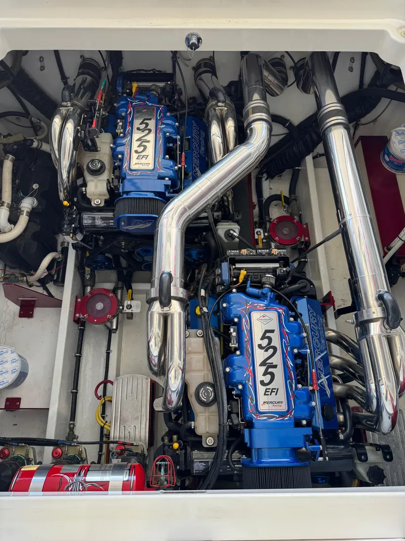 Slide: The Image of Twin 525 EFI engines in a 2008 Fountain 38 Lightning boat. - 38