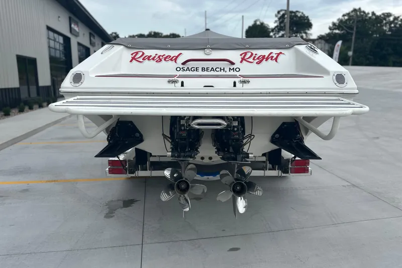 Slide: The Image of 2008 Fountain 38 Lightning boat, rear view, dual propellers, "Raised Right" text, Osage Beach, MO. - 71