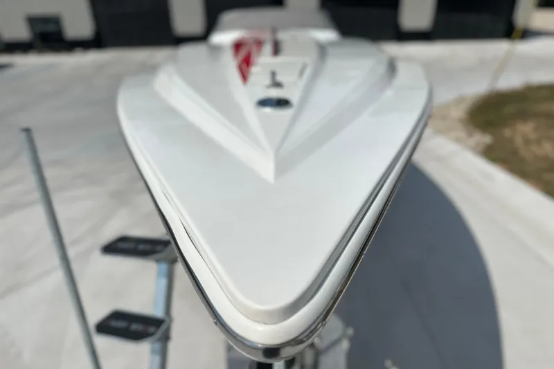 Slide: The Image of 2008 Fountain 38 Lightning boat bow, sleek design, parked on trailer. - 73