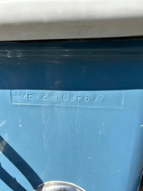 Slide: The Image of Hull identification number on a blue 2007 Jupiter 29FS boat. - 11