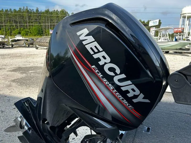 Slide: The Image of Outboard motor on a 2007 Triton TC-17 boat, featuring Mercury FourStroke branding. - 10