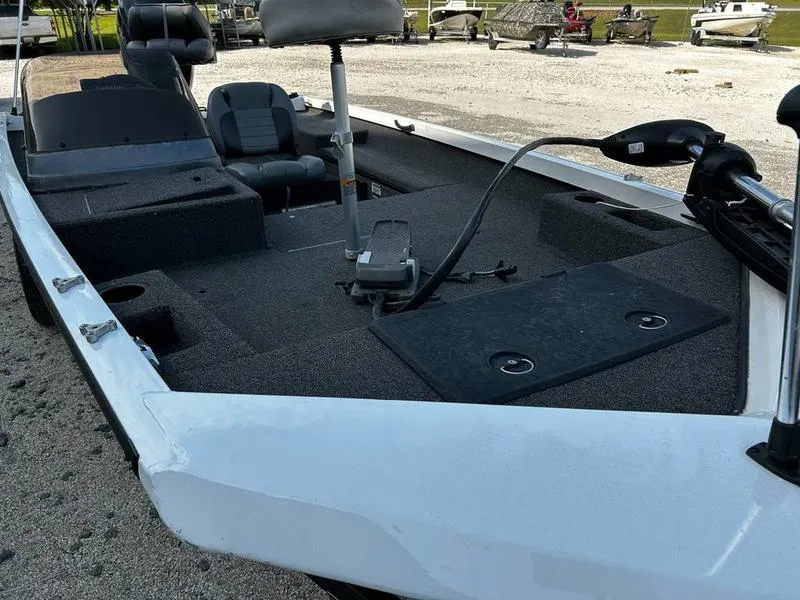 Slide: The Image of 2007 Triton TC-17 boat interior with seating and fishing equipment. - 4