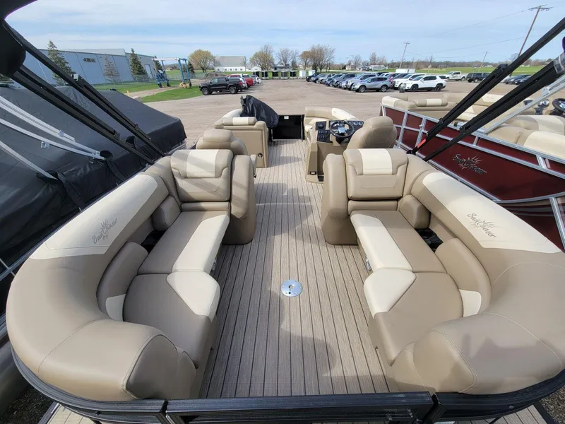 Slide: The Image of 2023 SunChaser Geneva Cruise 24 LR DH pontoon boat with spacious seating and modern design. - 17