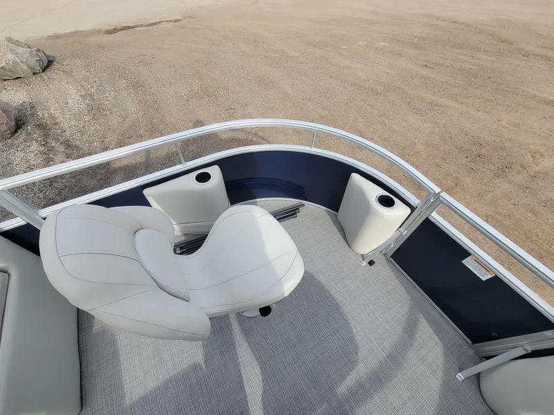 Slide: The Image of 2023 SunChaser Vista 16 Fish boat interior with white seating and cup holders. - 10