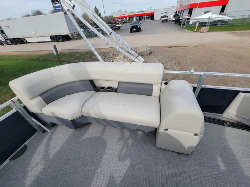 Slide: The Image of 2023 SunChaser Vista 16 Fish boat interior with gray seating and cup holders. - 13
