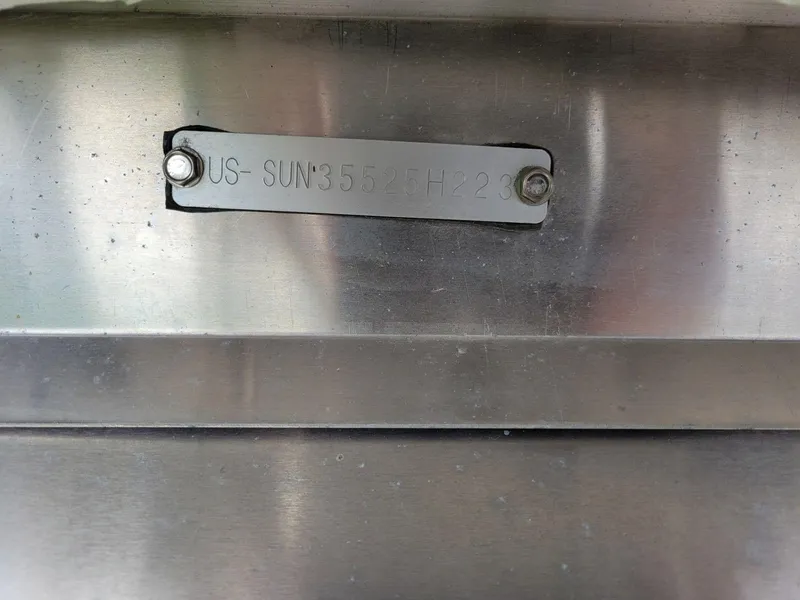 Slide: The Image of 2023 SunChaser Geneva Cruise 22 LR DH identification plate on metallic surface. - 14