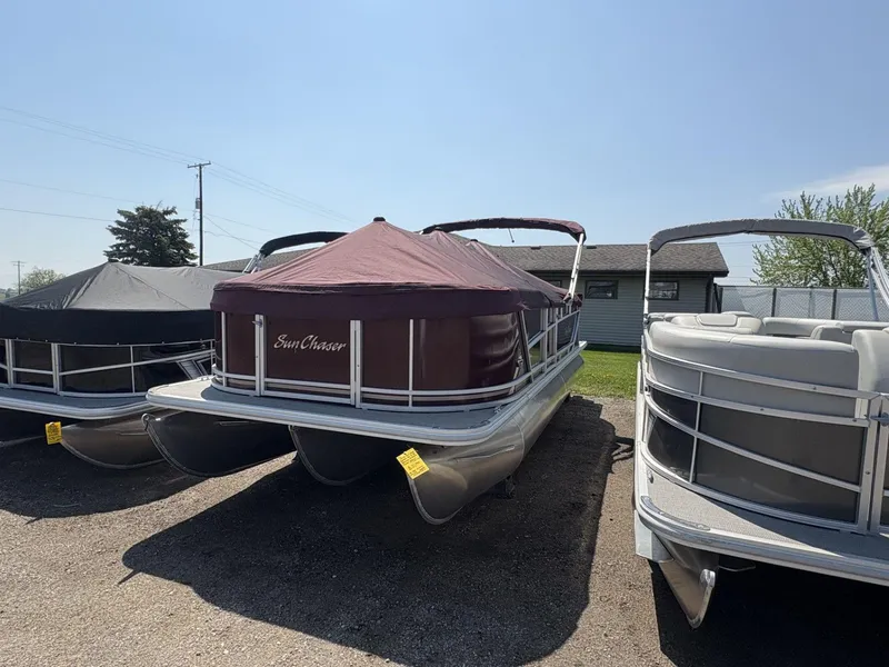 Slide: The Image of 2023 SunChaser Geneva Cruise 22 LR DH pontoon boats with covers in a lot. - 4