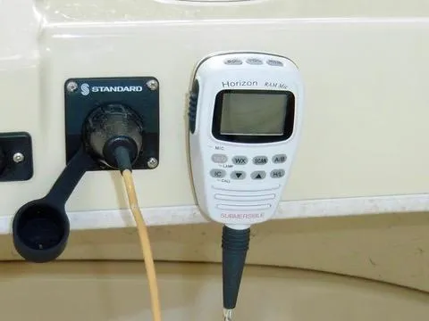 Slide: The Image of VHF radio and connector on 2001 Camano Trawler boat dashboard. - 10