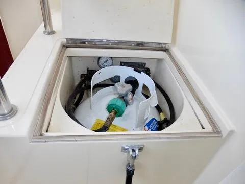 Slide: The Image of Propane tank compartment on a 2001 Camano Trawler boat. - 17