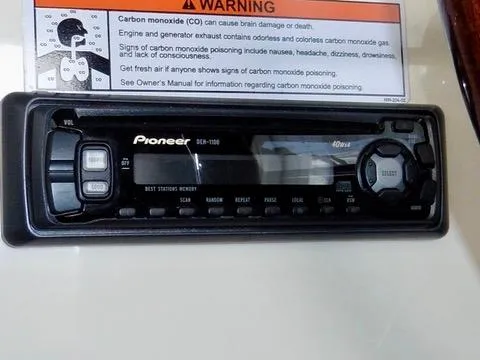 Slide: The Image of Pioneer stereo system in 2001 Camano Trawler with carbon monoxide warning label. - 27