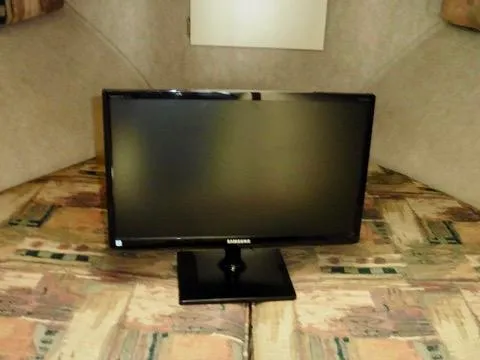 Slide: The Image of Samsung monitor inside 2001 Camano Trawler cabin, placed on patterned surface. - 38