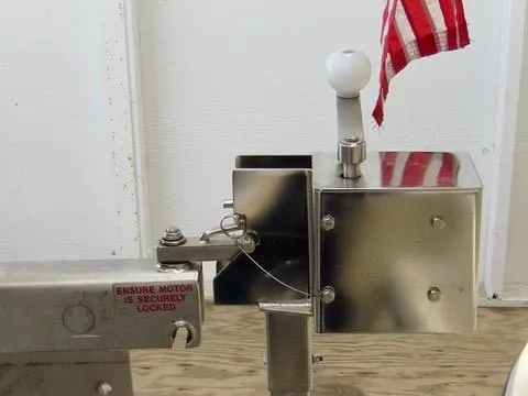 Slide: The Image of Stainless steel boat motor mount with safety pin and small flag, Camano Trawler 2001. - 45