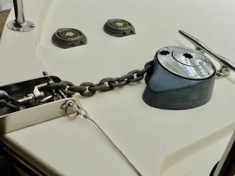 Slide: The Image of 2001 Camano Trawler deck with anchor chain and winch system. - 47