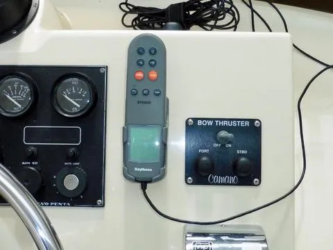 Slide: The Image of Control panel of a 2001 Camano Trawler with gauges and bow thruster controls. - 7