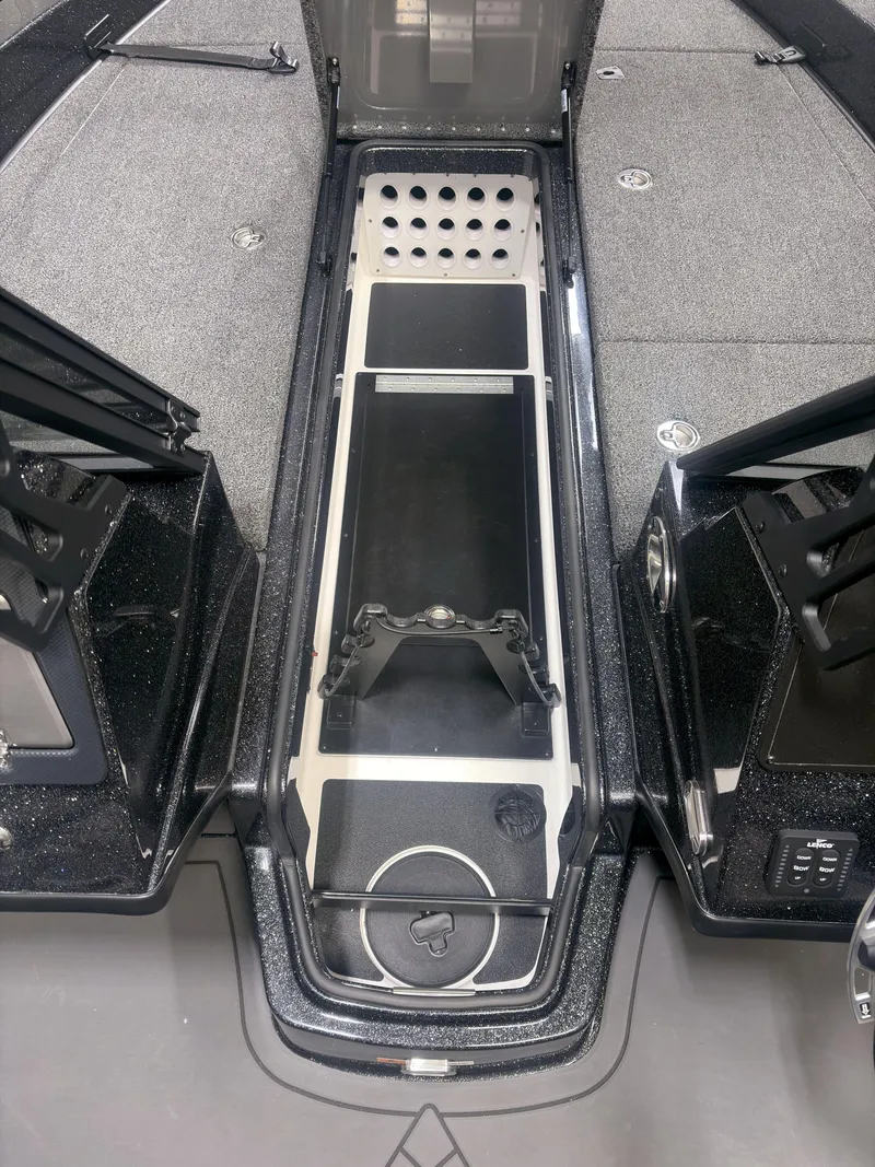 Slide: The Image of 2025 Caymas DV 22 boat interior with storage compartments and sleek design. - 6