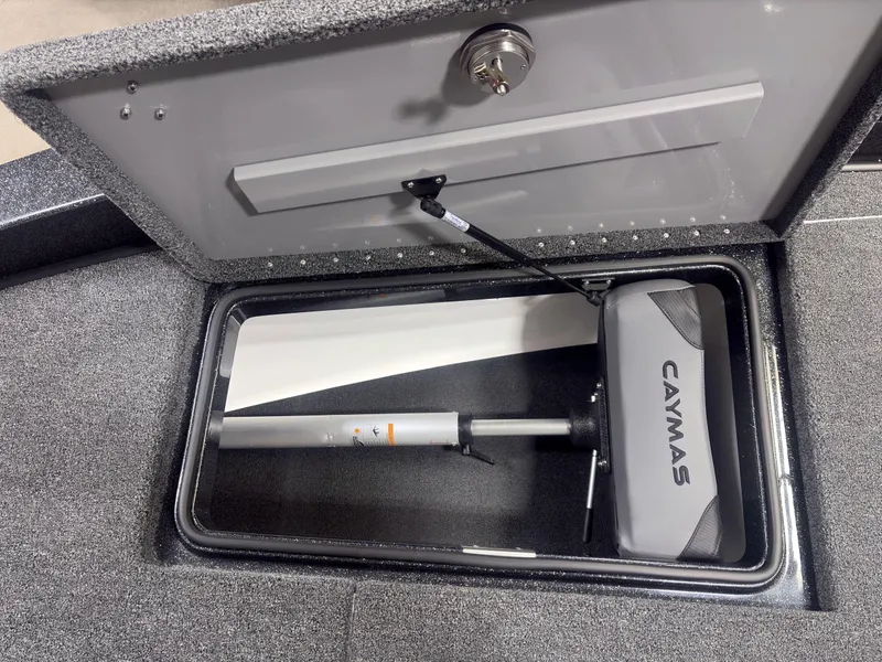 Slide: The Image of 2025 Caymas DV 22 storage compartment with hydraulic lift and branded cover. - 7