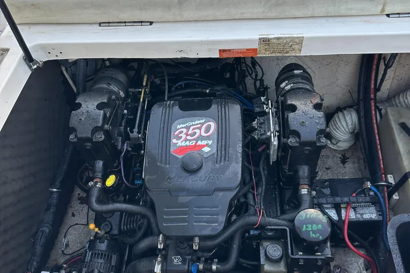 Slide: The Image of 2006 Rinker 262 Captiva Bowrider engine, featuring a 350 MAG MPI motor. - 27