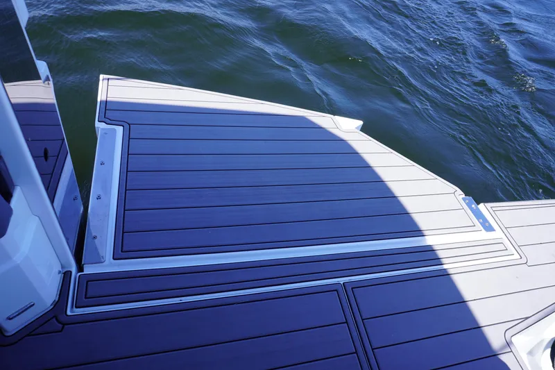 Slide: The Image of Deck of 2020 Cruisers Yachts 38 GLS OB, overlooking water. - 7