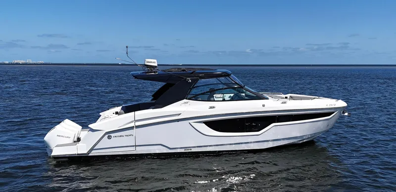 The Image of 2020 Cruisers Yachts 38 GLS OB on open water, side view. - 0